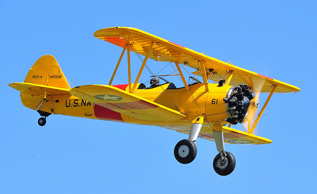 Boeing Stearman Kaydet in the colors of the US Navy, performing at an airshow